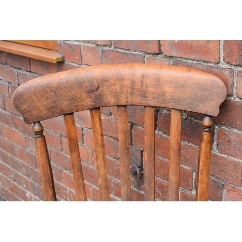 438 - High backed country / farmhouse arm chair with shaped saddle seat, 114cm tall.