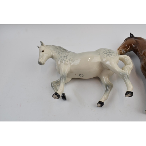 75 - Beswick 818 brown shire and a grey stocky jogging mare (2).