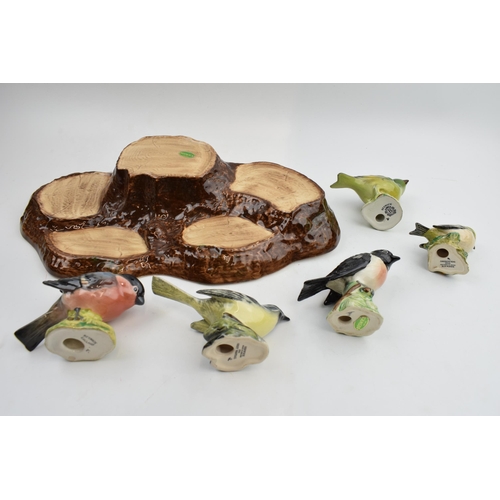 76 - A collection of Beswick birds on a Beswick base, to include, Yellow Wagtail, Bullfinch, Stonechat, G... 