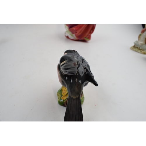 76 - A collection of Beswick birds on a Beswick base, to include, Yellow Wagtail, Bullfinch, Stonechat, G... 