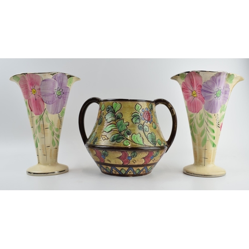 81C - A pair of Arthur Woods floral shaped trumpet vases and a large two handled floral vase, believed to ... 