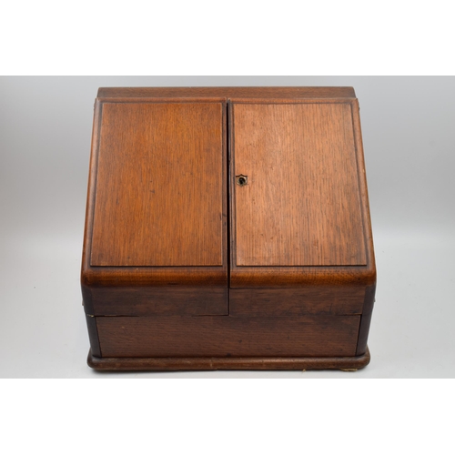 414 - 19th century mahogany writing box / letter rack with folding doors, 40cm wide, 33cm tall.