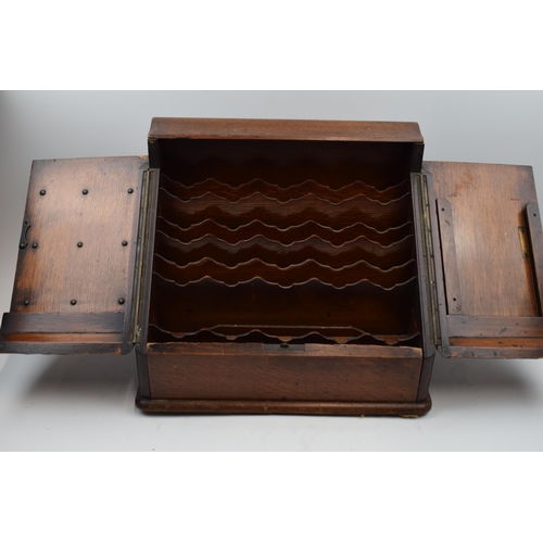 414 - 19th century mahogany writing box / letter rack with folding doors, 40cm wide, 33cm tall.