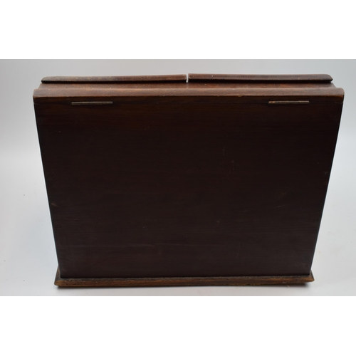 414 - 19th century mahogany writing box / letter rack with folding doors, 40cm wide, 33cm tall.