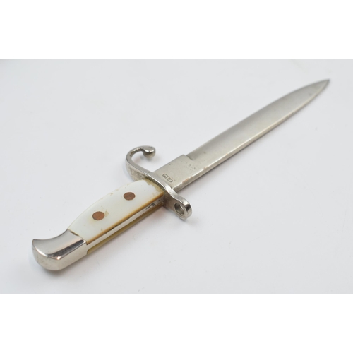 415 - German novelty letter opener in the form of a bayonet, 'Nieuport' to blade, 16.5cm long.