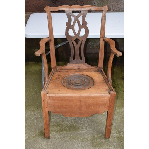 440 - Pine commode chair with ornate back and ceramic liner, 103cm tall.