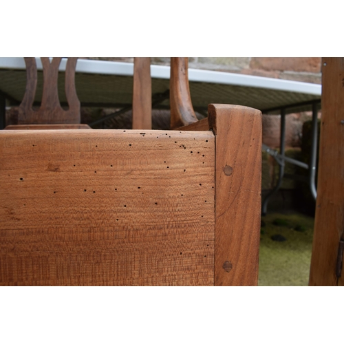 440 - Pine commode chair with ornate back and ceramic liner, 103cm tall.