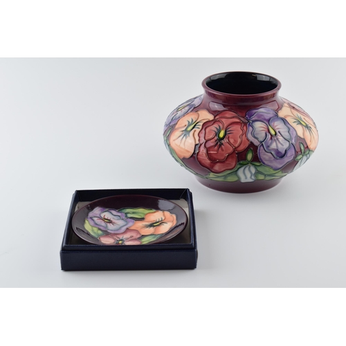 103 - Moorcroft Pansies large bulbous vase, 18cm diameter, with a boxed coaster (2).