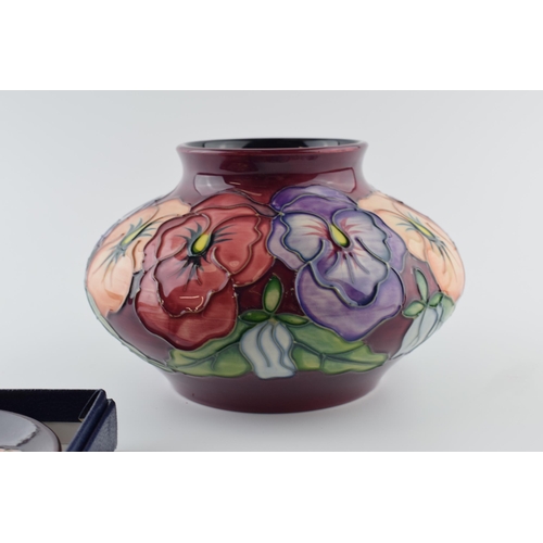 103 - Moorcroft Pansies large bulbous vase, 18cm diameter, with a boxed coaster (2).