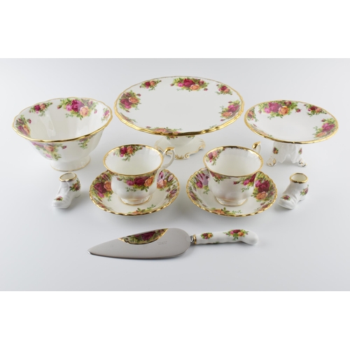 164 - An extensive collection of Royal Albert Old Country Roses tea and dinner ware to include cups, sauce... 