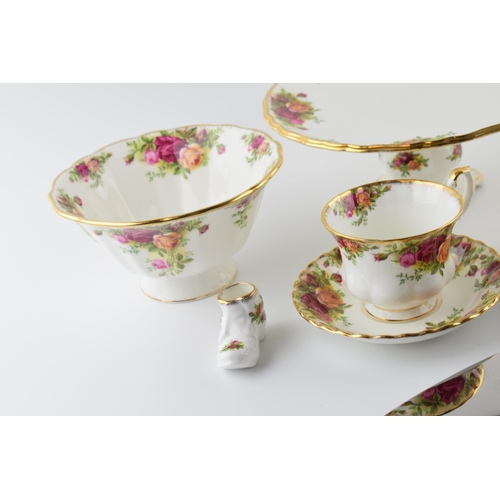 164 - An extensive collection of Royal Albert Old Country Roses tea and dinner ware to include cups, sauce... 