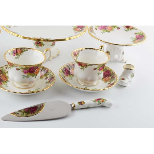 164 - An extensive collection of Royal Albert Old Country Roses tea and dinner ware to include cups, sauce... 