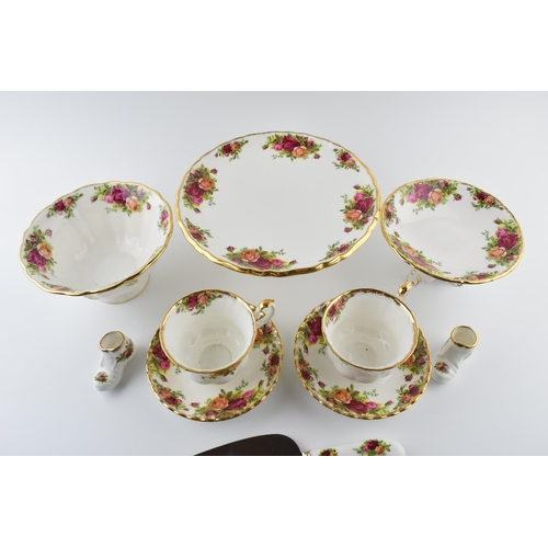 164 - An extensive collection of Royal Albert Old Country Roses tea and dinner ware to include cups, sauce... 