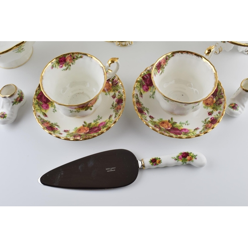 164 - An extensive collection of Royal Albert Old Country Roses tea and dinner ware to include cups, sauce... 