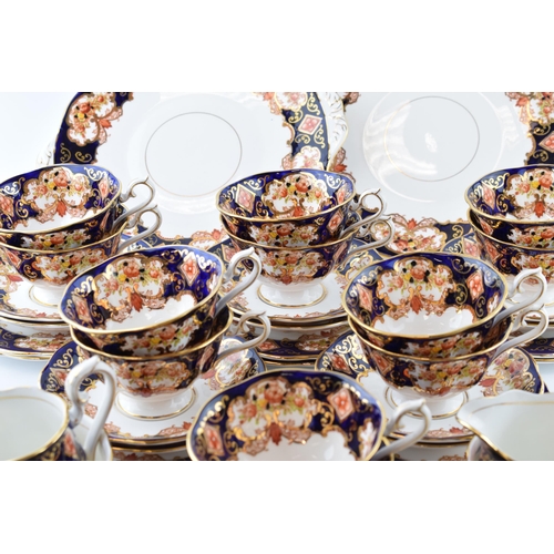 165 - Royal Albert Heirloom tea ware to include 12 cups, 12 saucers, 12 side plates, 2 milk jugs, 2 sugar ... 