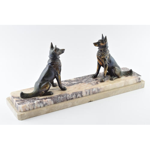 178 - French Art Deco spelter figures consisting of a pair of alsatians, mounted on a marble base, 46cm lo... 