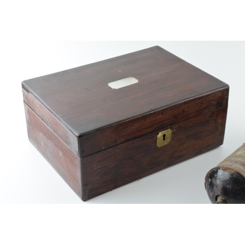 187 - An early 20th century mahogany jewellery box with Mother of Pearl inlay together with a vintage bras... 