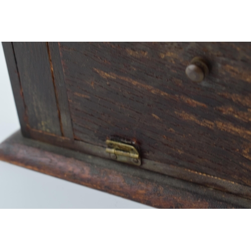 192 - 1930s brass fronted perpetual calendar complete with month and date cards with working scroll.