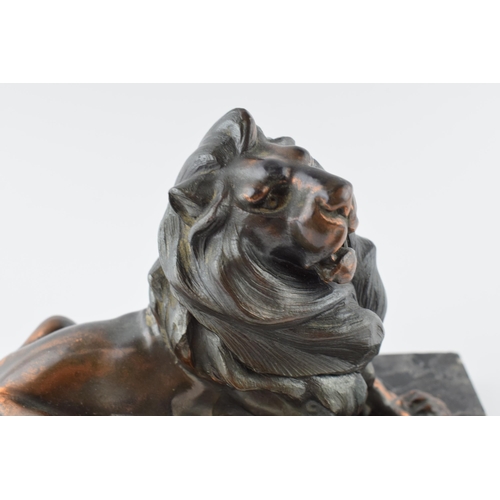 193 - French Art Deco inkwell in the form of a lion mounted onto marble, 23cm long.