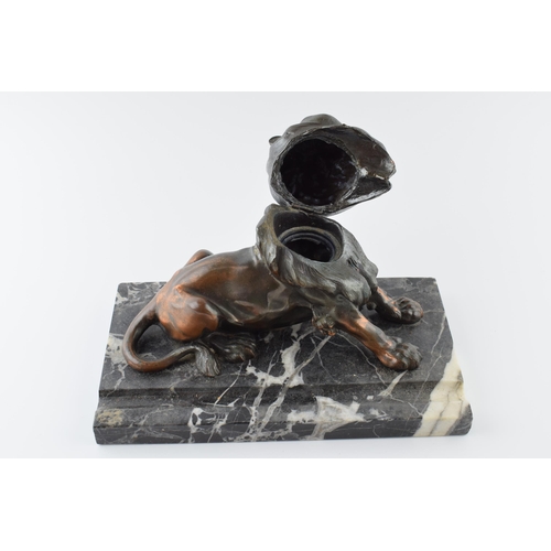 193 - French Art Deco inkwell in the form of a lion mounted onto marble, 23cm long.