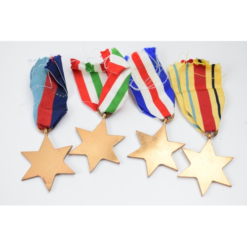 367 - A set of 4 World War Two star medals with ribbons to include The Africa Star, The France and Germany... 