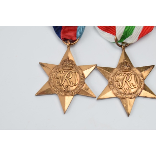 367 - A set of 4 World War Two star medals with ribbons to include The Africa Star, The France and Germany... 