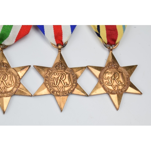 367 - A set of 4 World War Two star medals with ribbons to include The Africa Star, The France and Germany... 