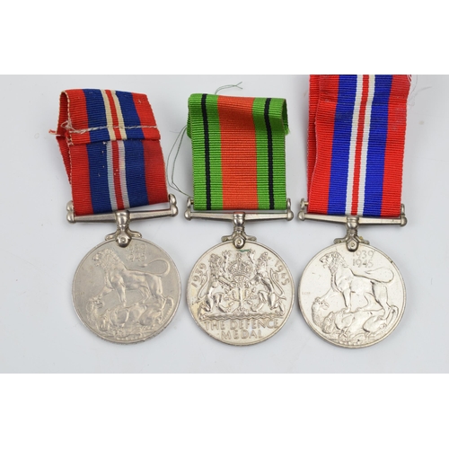 368 - World War Two medals to include 1939-1945 medal awarded to W546820 A F Schoeman with unnamed Defence... 