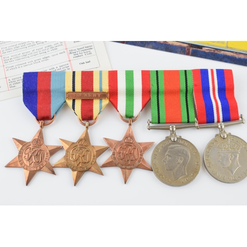 373 - World Way Two 8th Army medals to include the Africa Star, Italy Star, 1939-1945 Star, the Defence Me... 