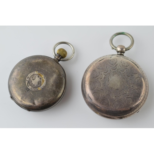 416 - A pair of sterling silver pocket watches to include a 5cm diameter example, London 1887, and a Freem... 