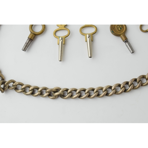 435 - Hallmarked silver Albert chain, 46.2 grams, 40cm long, with a collection of keys.