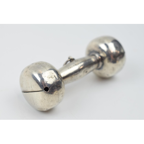 441 - Silver baby rattle in the form of a dumbbell, 28.2 grams, 8.5cm long.