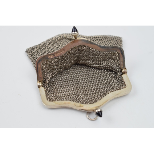 443 - Sterling silver mesh purse with stone set clasps, 37.1 grams, hallmarked to inside.