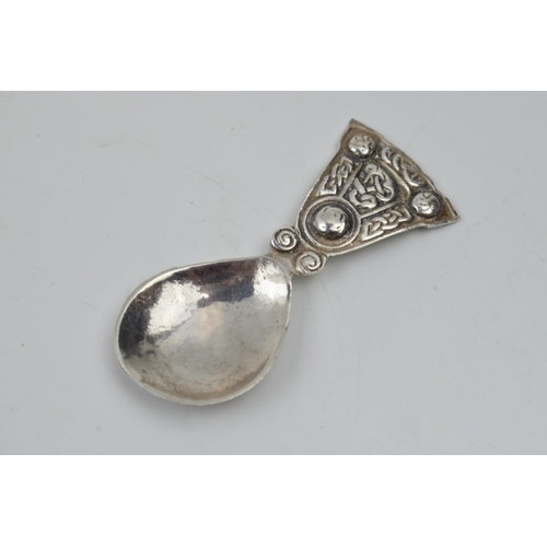 445 - Hallmarked silver caddy spoon in Arts and Crafts style, 16.8 grams, Birmingham 1936.