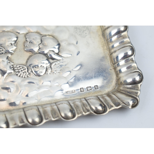 448 - Hallmarked silver tray with Reynold's Angels design, Birmingham 1907, 28.1 grams, 10cm diameter.