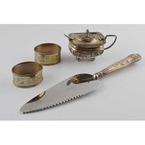 451 - A collection of hallmarked silver items to include a cruet, a pair of napkin rings, weighable silver... 