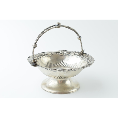 457 - Hallmarked silver sweet dish / pedestal basket with ornate handle, Birmingham 1895, 11.5cm diameter,... 