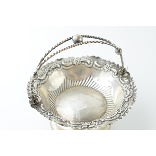 457 - Hallmarked silver sweet dish / pedestal basket with ornate handle, Birmingham 1895, 11.5cm diameter,... 