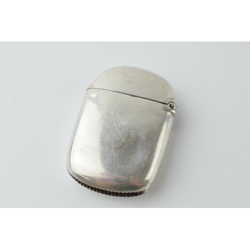 460 - Hallmarked silver vesta case with engraved decoration, 15.4 grams, Birmingham 1895.