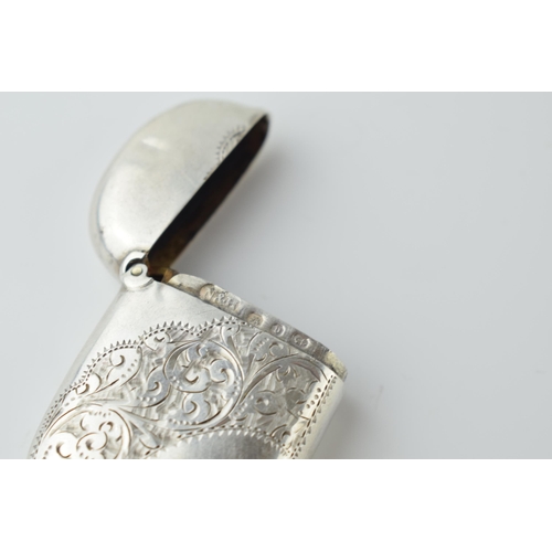 460 - Hallmarked silver vesta case with engraved decoration, 15.4 grams, Birmingham 1895.