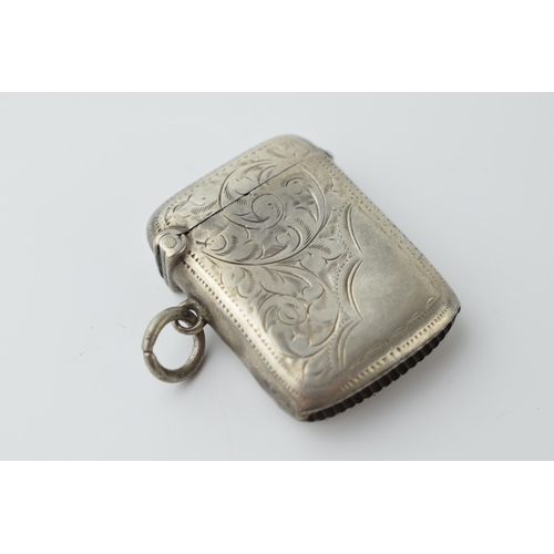 463 - Hallmarked silver vesta case with engraved decoration, 15.3 grams, Birmingham.