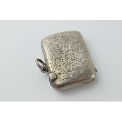 463 - Hallmarked silver vesta case with engraved decoration, 15.3 grams, Birmingham.