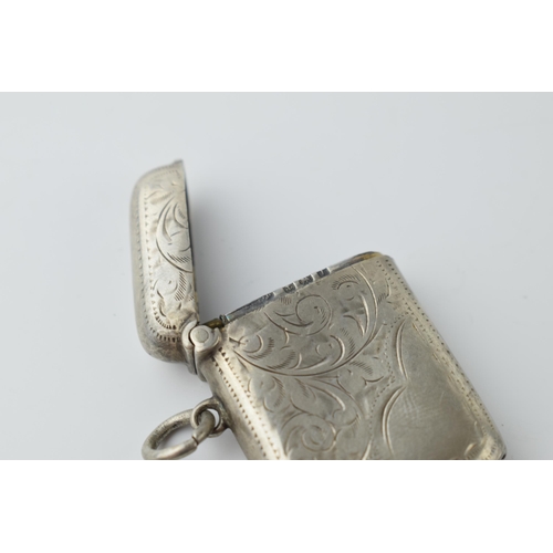 463 - Hallmarked silver vesta case with engraved decoration, 15.3 grams, Birmingham.