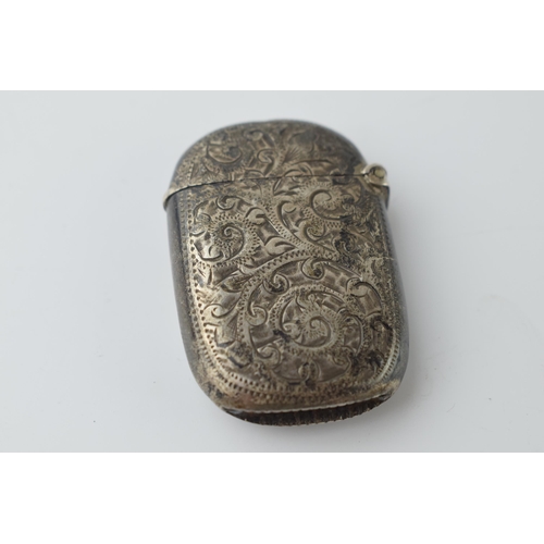 466 - Hallmarked silver vesta case with engraved decoration, 19.2 grams, Birmingham 1899.