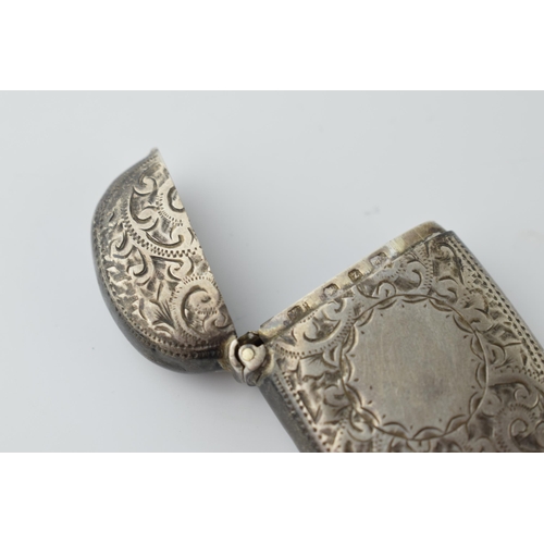 466 - Hallmarked silver vesta case with engraved decoration, 19.2 grams, Birmingham 1899.