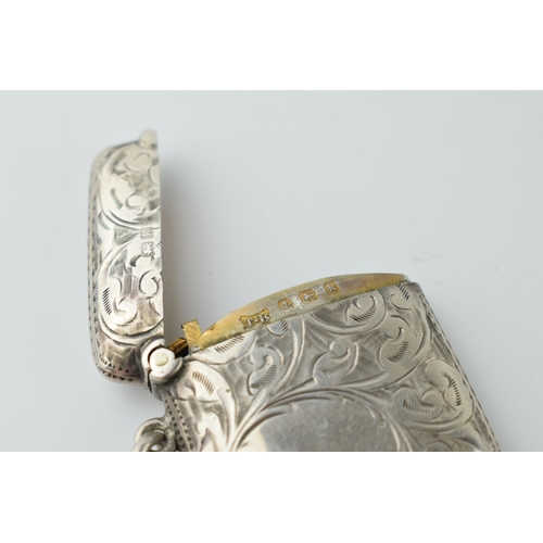 467 - Hallmarked silver vesta case with engraved decoration, 14.7 grams, Birmingham 1909.