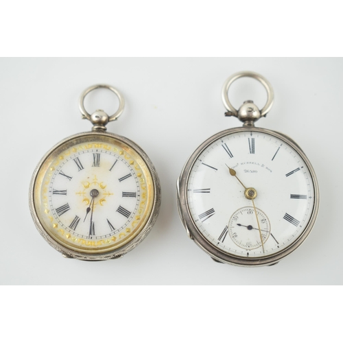 469 - A pair of ladies silver pocket watches to include a silver 0.935 example and a sterling Thomas Russe... 