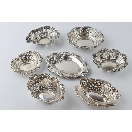 470 - A collection of hallmarked silver sweet dishes of varying styles and sizes, combined weight 185.7 gr... 