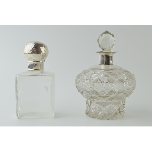 475 - Silver and glass perfume bottle with screw top lid, London 1909, 12cm tall with a silver and glass p... 