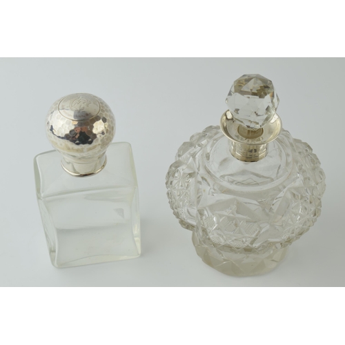 475 - Silver and glass perfume bottle with screw top lid, London 1909, 12cm tall with a silver and glass p... 